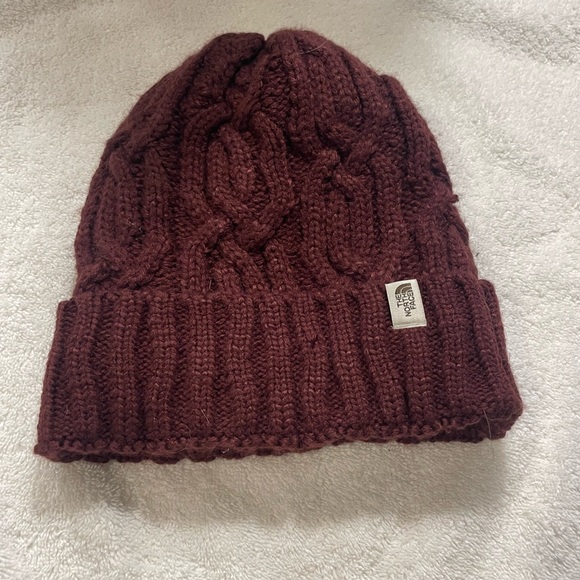 The North Face Accessories - North Face Cable Knit Minna Beanie in a burgundy
